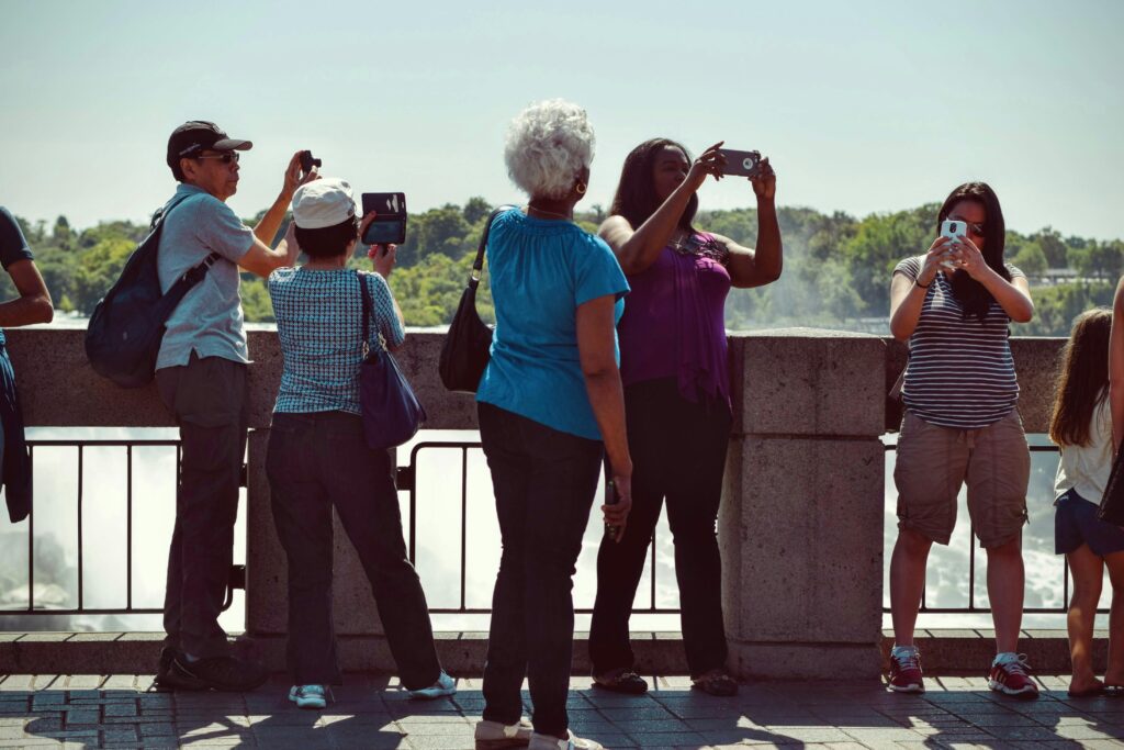 People Taking Pictures during Daytime